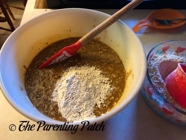 Adding the Dry Ingredients to the Wet Ingredients for Brown Bread
