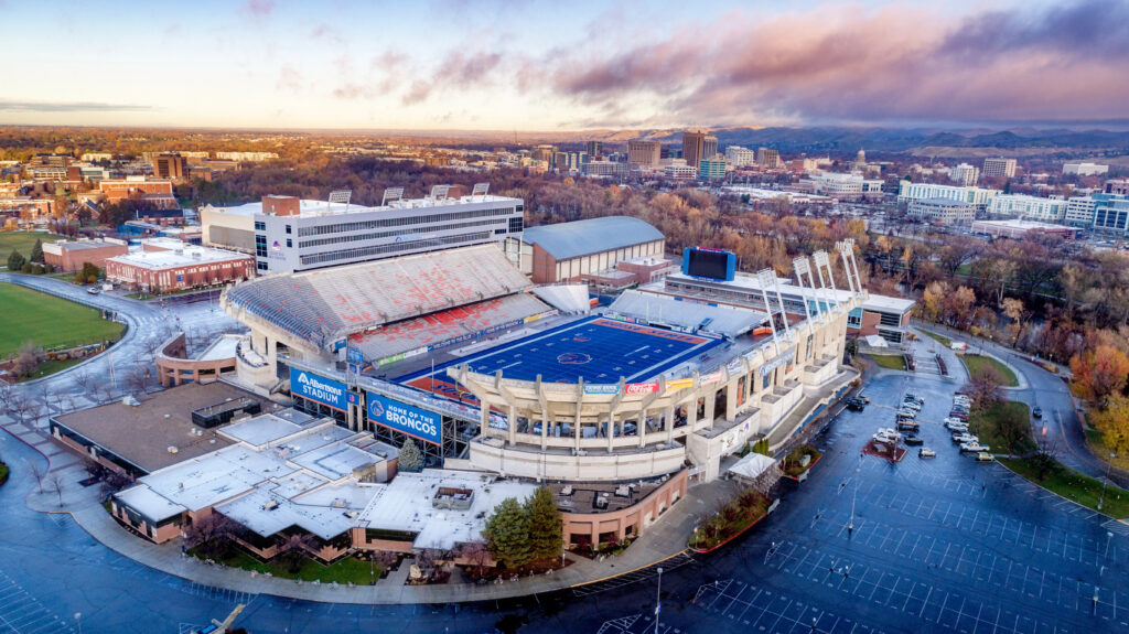 Boise, Idaho, USA  November 24, 2017: Unique blue football turf and Boise Idaho skyline