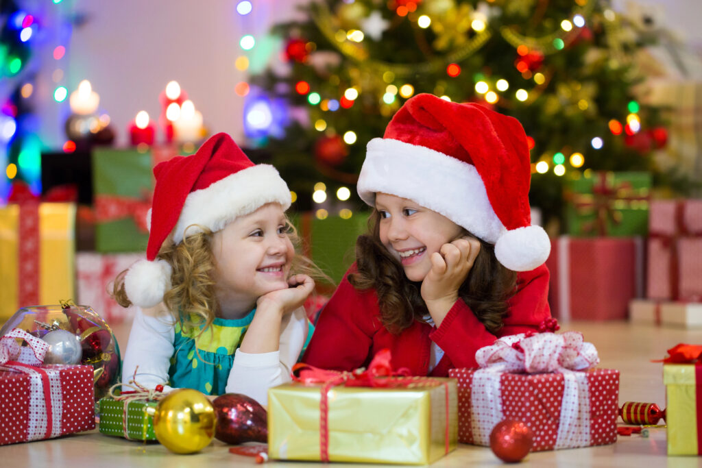 little girls  with the Christmas gifts