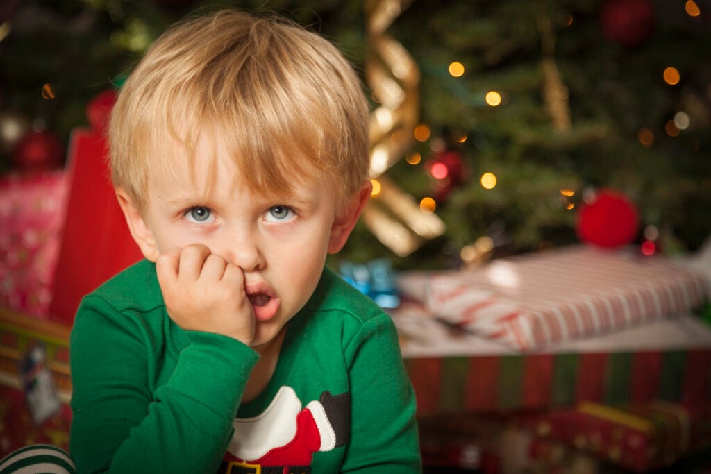 Little boy is disappointed at Christmas