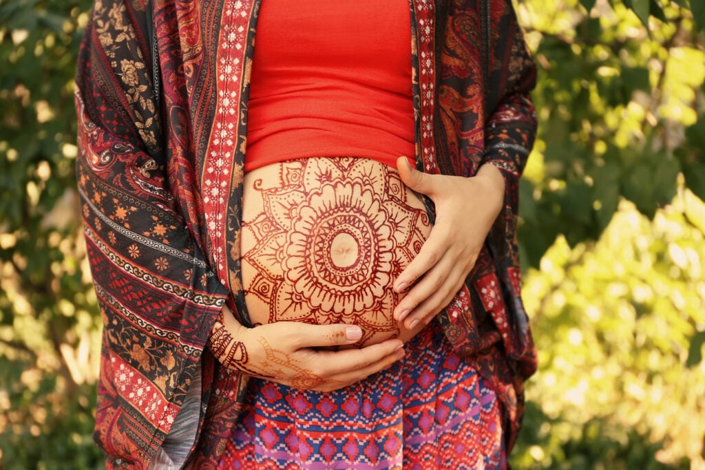 Pregnant Belly With Henna Tattoo
