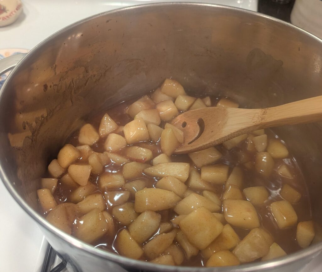 apple pie filling in a mixing pot